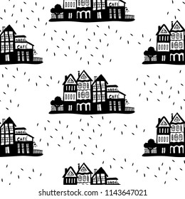 Cartoon vector pattern with hand-drawn houses. 