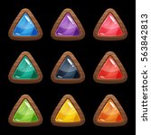 Cartoon vector triangle buttons set with colorful middles in wooden frame, isolated on black background.