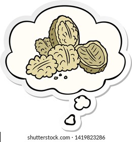 nueces de dibujos animados con burbuja de pensamiento como pegatina impresa