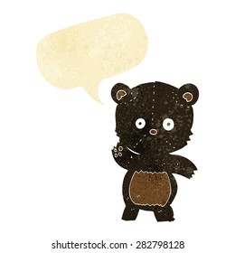 cartoon waving black bear with speech bubble