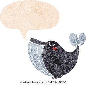 cartoon whale with speech bubble in grunge distressed retro textured style