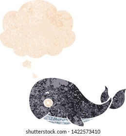 cartoon whale with thought bubble in grunge distressed retro textured style