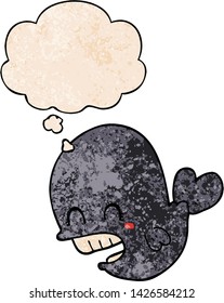 cartoon whale with thought bubble in grunge texture style