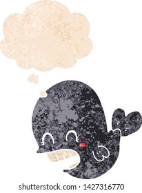cartoon whale with thought bubble in grunge distressed retro textured style