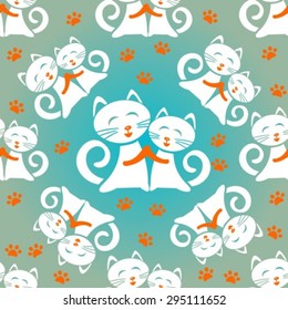 Cartoon white cats on a blue background. Seamless pattern.