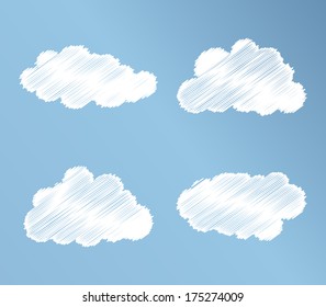 Cartoon white clouds on blue sky for design