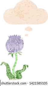 cartoon wild flower with thought bubble in grunge distressed retro textured style
