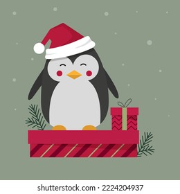 cartoon winter christmas character penguin wearing hat on standing on gift box