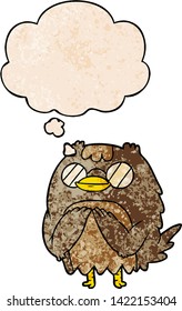 cartoon wise old owl with thought bubble in grunge texture style
