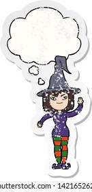 cartoon witch with thought bubble as a distressed worn sticker