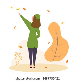 Cartoon woman in warm clothes catches flying leaves. Beautiful outdoor autumn seasonal composition. Modern flat vector illustration. Back view.