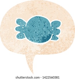 cartoon wrapped candy with speech bubble in grunge distressed retro textured style