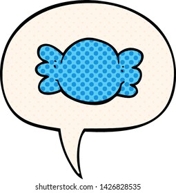 cartoon wrapped candy with speech bubble in comic book style