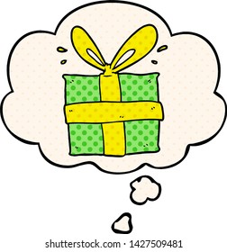 cartoon wrapped gift with thought bubble in comic book style