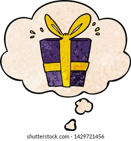 cartoon wrapped gift with thought bubble in grunge texture style