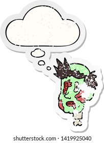 cartoon zombie head with thought bubble as a distressed worn sticker