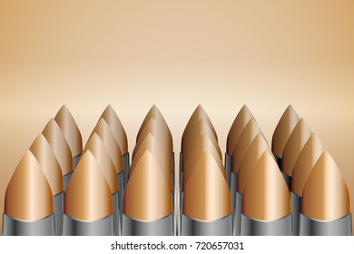 Cartridges with copper bullets stand in columns