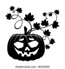 The carved face of pumpkin glowing on Halloween