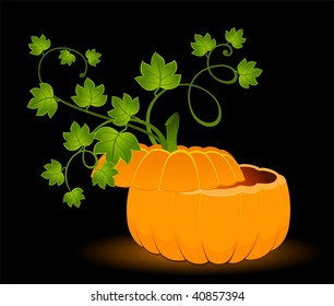  The carved face of pumpkin glowing on Halloween