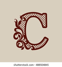 Carved openwork floral pattern initial letters C. Template can be used for interior design, laser cutting or printing greeting and wedding cards, invitations, etc.