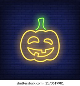 Carved pumpkin neon icon. Terrifying grimly smiling Halloween character. Halloween concept. Vector illustration can be used for street wall signs, all Hallows day, party announcements.