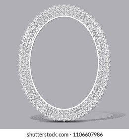 carved vintage frame made of paper for picture or photo with shadow on light background