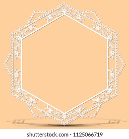 carved vintage frame made of paper for picture or photo with shadow on light background