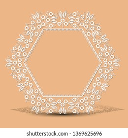 carved vintage frame made of paper for picture or photo with shadow on light background