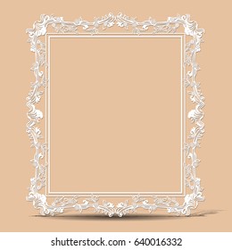 carved vintage frame made of paper for picture or photo with shadow on gray background