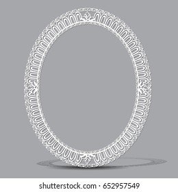 carved vintage frame made of paper for picture or photo with shadow on light background