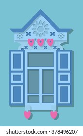 carved wooden window decorated with hearts on a blue background
