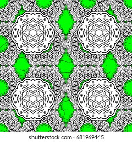 Carving. Element woodcarving. Small depth of field. Pattern on green and white background with elements. Patina. Luxury furniture. Green and white tree with white trim. Furniture in classic style.