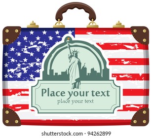 case with American flag and Statue of Liberty in background on New York City