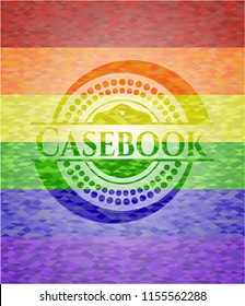 Casebook on mosaic background with the colors of the LGBT flag