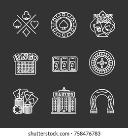 Casino chalk icons set. Cards suits, gambling chip, blackjack, bingo, lucky seven, roulette, casino building, horseshoe. Isolated vector chalkboard illustrations