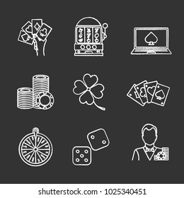 Casino chalk icons set. Four aces, slot machine, online casino, dice, croupier, wheel of fortune, gambling chip, four leaf clover. Isolated vector chalkboard illustrations