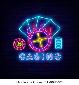 Casino neon signboard. Logotype template. Internet gambling game. Roulette, playing cards and chips. Winner concept. Glowing label on brick wall. Vector stock illustration