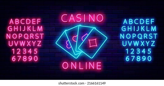 Casino online neon sign. Playing cards. Shiny pink and blue alphabet. Internet gambling game. Winner concept. Glowing emblem on brick wall. Editable stroke. Vector stock illustration