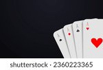 Casino or poker background with realistic cards on a dark background. Four aces with red and black suits.