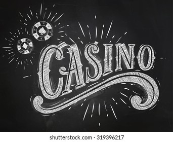 Casino sign with playing chips drawing with chalk on chalkboard