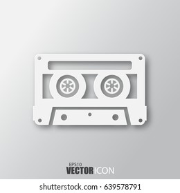 Cassette icon in white style with shadow isolated on grey background. For your design, logo. Vector illustration.
