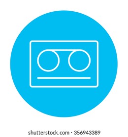 Cassette tape line icon for web, mobile and infographics. Vector white icon on the light blue circle isolated on white background.