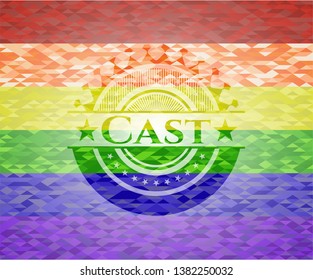 Cast on mosaic background with the colors of the LGBT flag