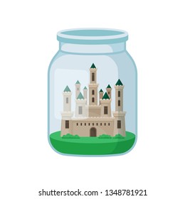 Castle in glass jar on white background.