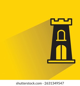 Icono de castillo con sombra sobre fondo amarillo