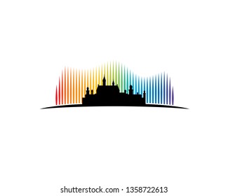 castle silhouette standing high in front of aurora borealis light