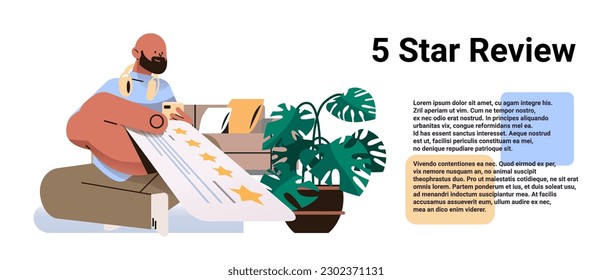 casual man holding review stars rating customer feedback satisfaction level online survey concept