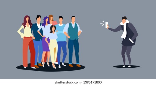 casual man using smartphone taking photo of young people group standing together sketch doodle horizontal full length