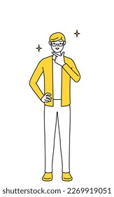 A casually dressed young man in a confident pose.