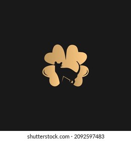 Cat abstract logo design with flowers. Flower and cat combination . Golden color logo on black background. 